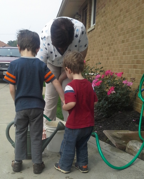 Good thing Nana loves them. Who else would help them water the driveway?